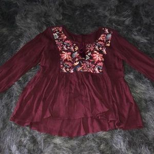Burgundy top with floral embroidery